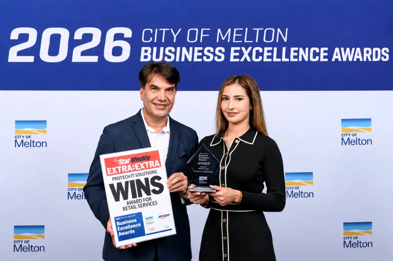 The ProTech team on stage at the 2026 City of Melton Business Excellence Awards, holding the glass trophy and a Star Weekly sign reading Protech IT Solutions wins Award for Retail Services